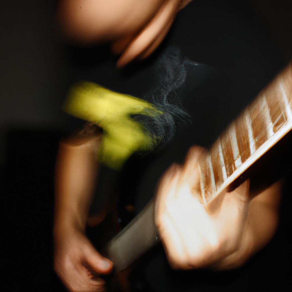 Person playing electric guitar, headbanging